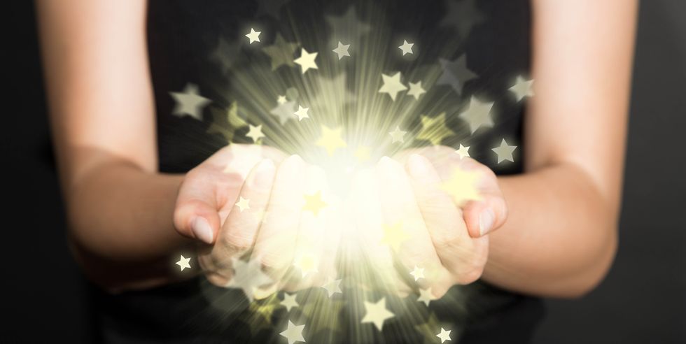 light-of-stars-in-hands-royalty-free-image-1670227551